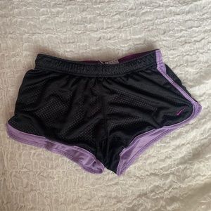 Nike mesh black and purple athletic shorts